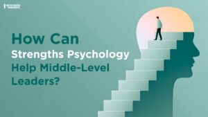Illustration of a middle-level leader climbing steps inside a human head silhouette, symbolising growth through strengths psychology and leadership development.